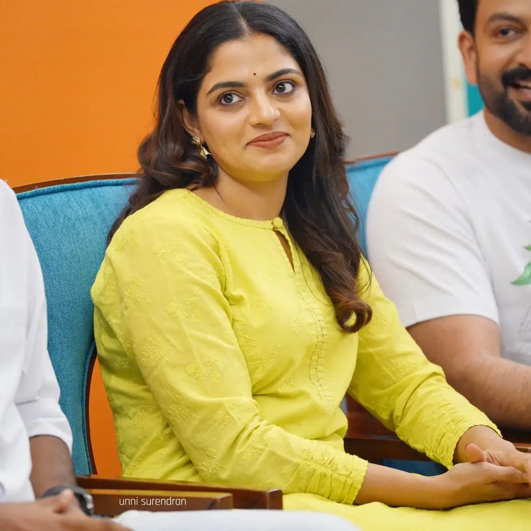 Actress Nikhila Vimal Long Hair Smiling Face Green Gown